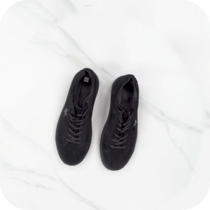 Pair of black footwear items positioned beside each other on a clean white background.